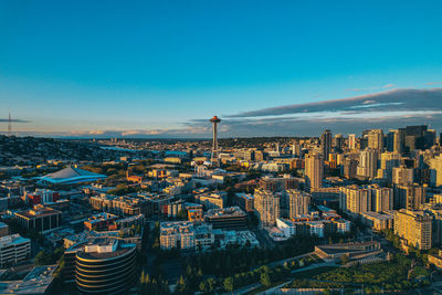 Aerial view of cityscape against sky