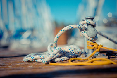 Close-up of rope against blue sea