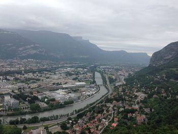 High angle view of buildings in city against sky