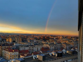 High angle view of townscape against sky at sunset