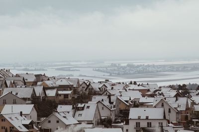 High angle view of townscape against sky during winter