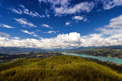 Scenic view of mountains against cloudy sky