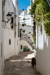 Alley amidst buildings in city