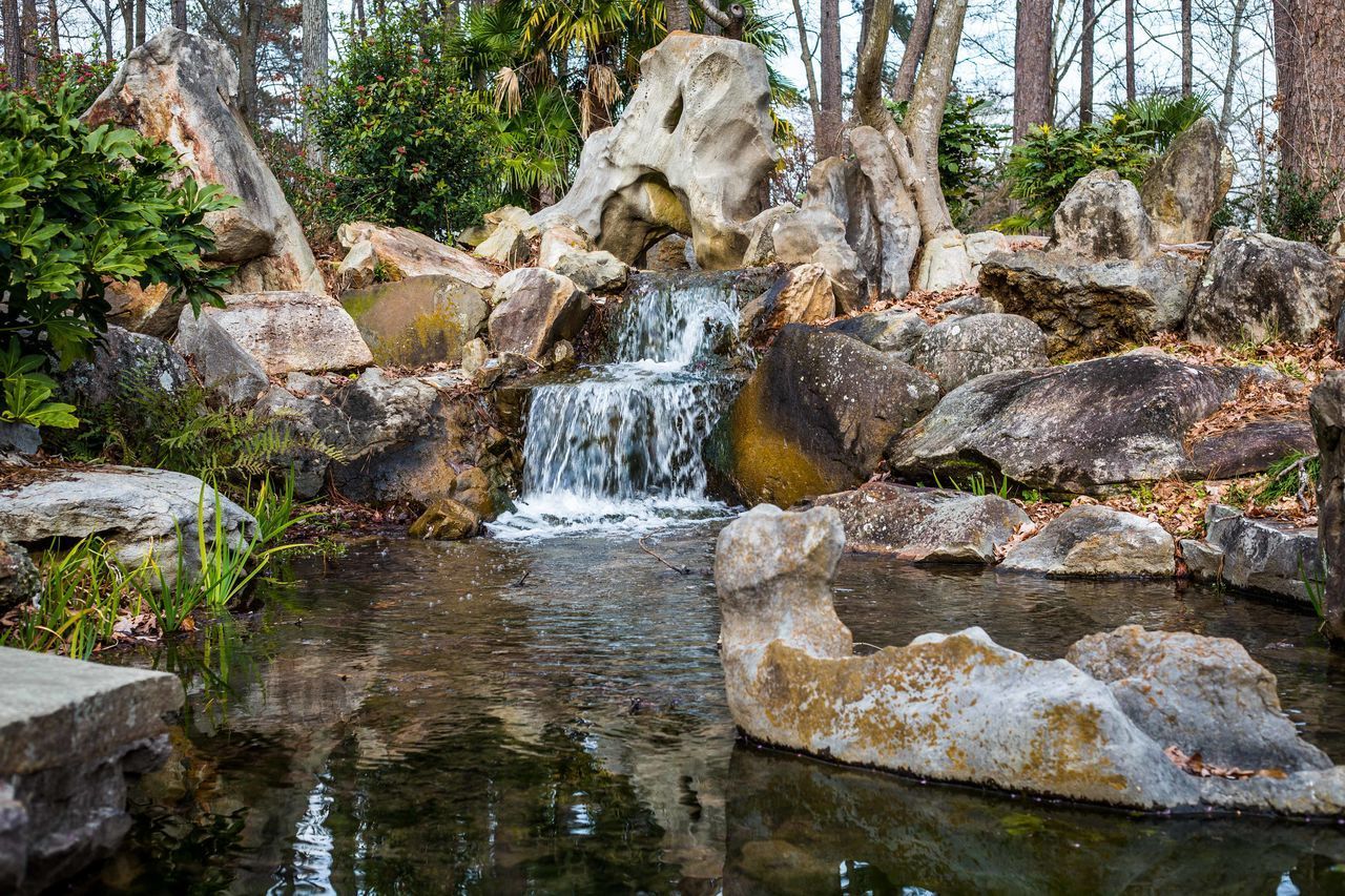 STREAM FLOWING THROUGH ROCKS