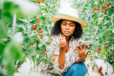 Young woman using mobile phone