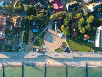 High angle view of sign and buildings in city