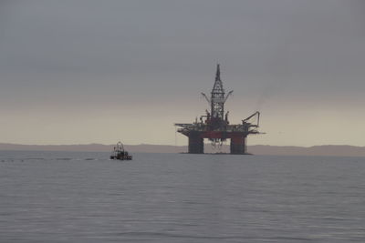 Ship in sea against sky