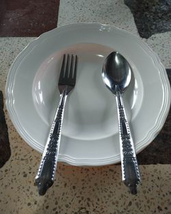 High angle view of empty plate on table