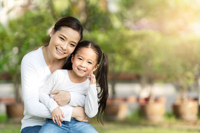 Portrait of happy mother and daughter