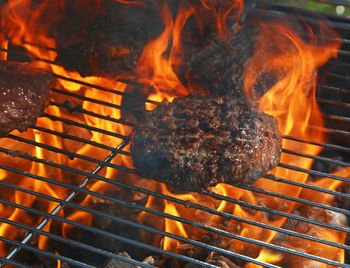 Close-up of meat on barbecue grill