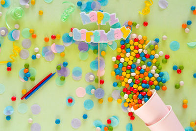 High angle view of multi colored balloons on table