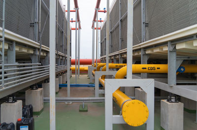 Low angle view of yellow buildings in factory