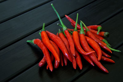 High angle view of chili peppers on table