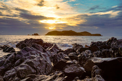 Scenic view of sea against sky during sunset