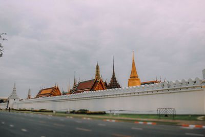 View of building against cloudy sky