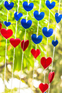 Low angle view of heart shape balloons