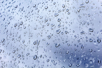 Close-up of water drops on glass