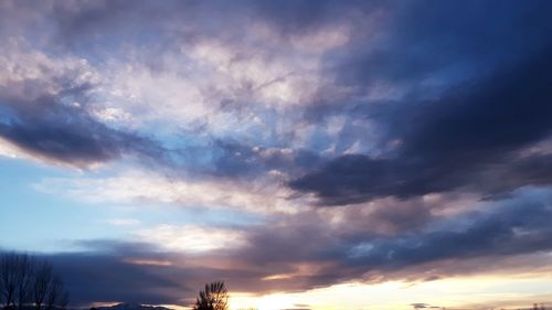 Low angle view of dramatic sky during sunset