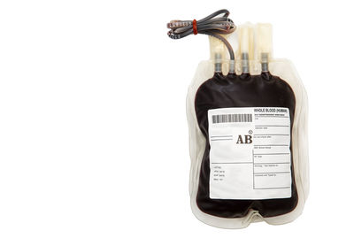 High angle view of text on bottle against white background