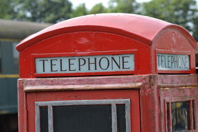 Close-up of red telephone booth
