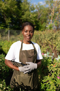 African american female farmer with tablet