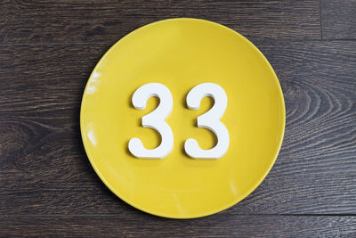 High angle view of number on table
