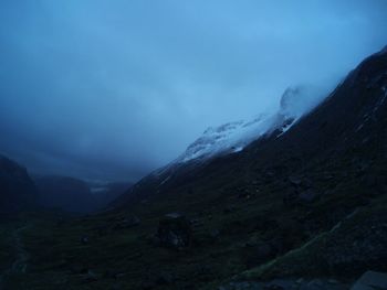 Scenic view of snowcapped mountain against sky