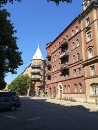 View of city street against clear sky