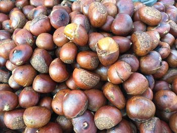 Full frame shot of chestnuts at market stall for sale