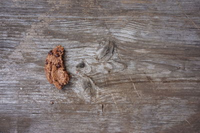 Directly above shot of chocolate cookie on wooden table