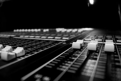 Close-up of sound mixer at recording studio