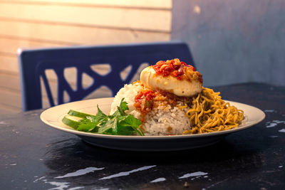 Close-up of food served on table