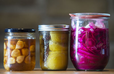 Close-up of various preserves in jars on table