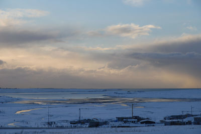 Scenic view of sea against sky during winter