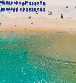 Aerial view amazing sandy beach and small waves beautiful tropical sea in the morning summer season 
