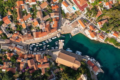 High angle view of illuminated buildings in city