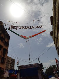 Low angle view of buildings against sky in city