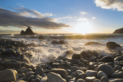 Scenic view of sea against sky during sunset