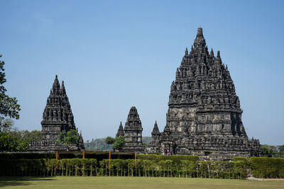 View of temple against building