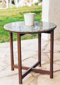 Close-up of coffee cup on table