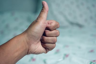 Close-up of person hand holding water