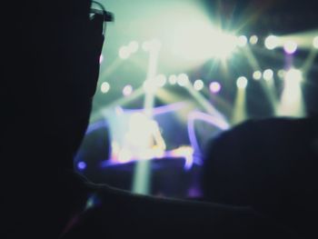 Close-up of hands at music concert