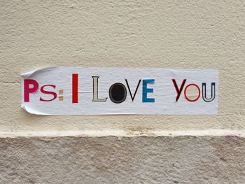 Close-up of text on wall
