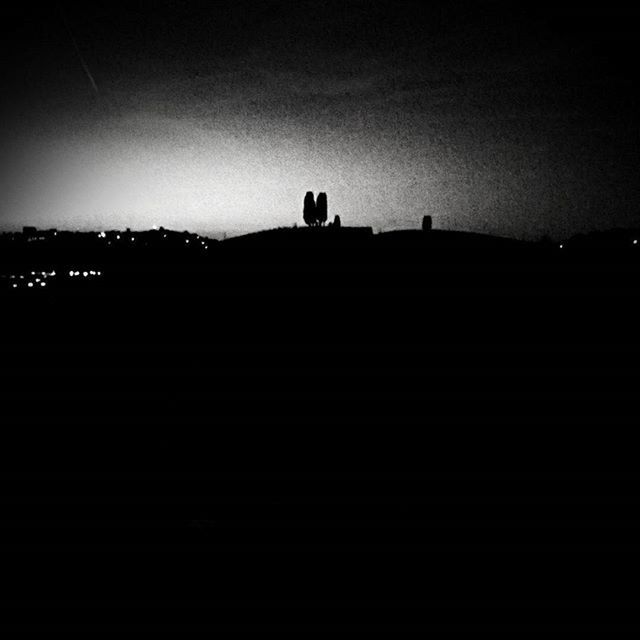 silhouette, night, dark, copy space, sky, dusk, outline, men, illuminated, sunset, tranquil scene, tranquility, landscape, lifestyles, scenics, unrecognizable person, nature, leisure activity, standing