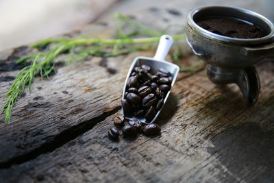Close-up of coffee beans on table
