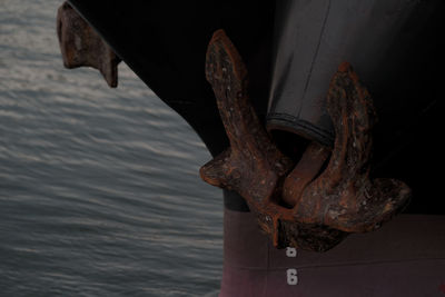 Close-up of rusty chain on boat