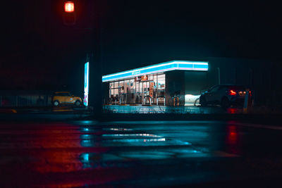 Illuminated car on road at night