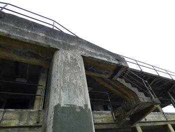 Low angle view of old building against clear sky