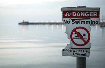 Warning sign swimming not allowed