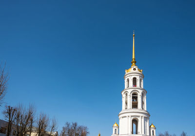 Low angle view of building against clear blue sky